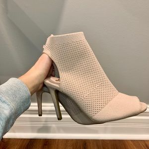 Pink covered high heels with open toe